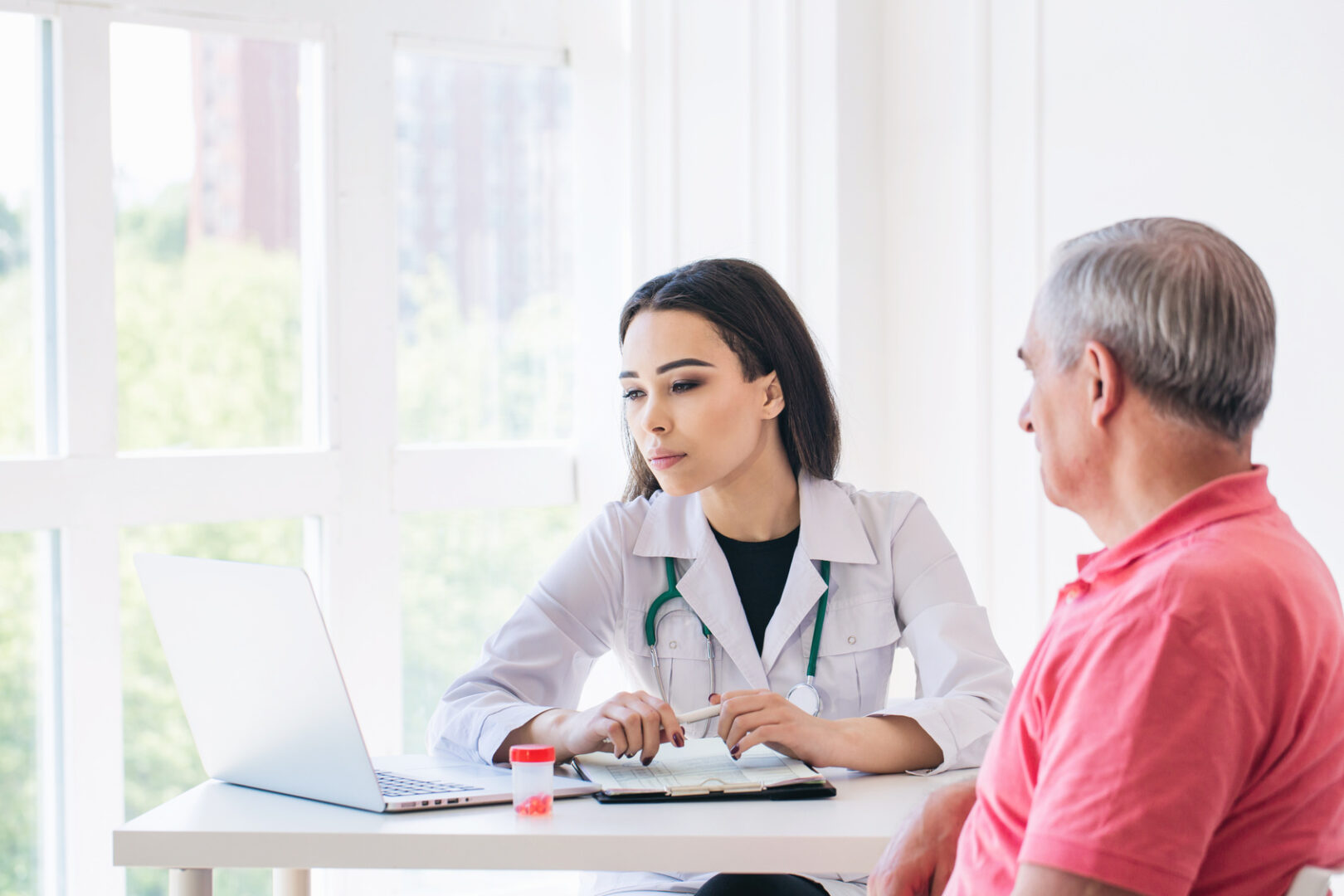 Senior patient listen to young woman doctor in a hospital - Monroe ...